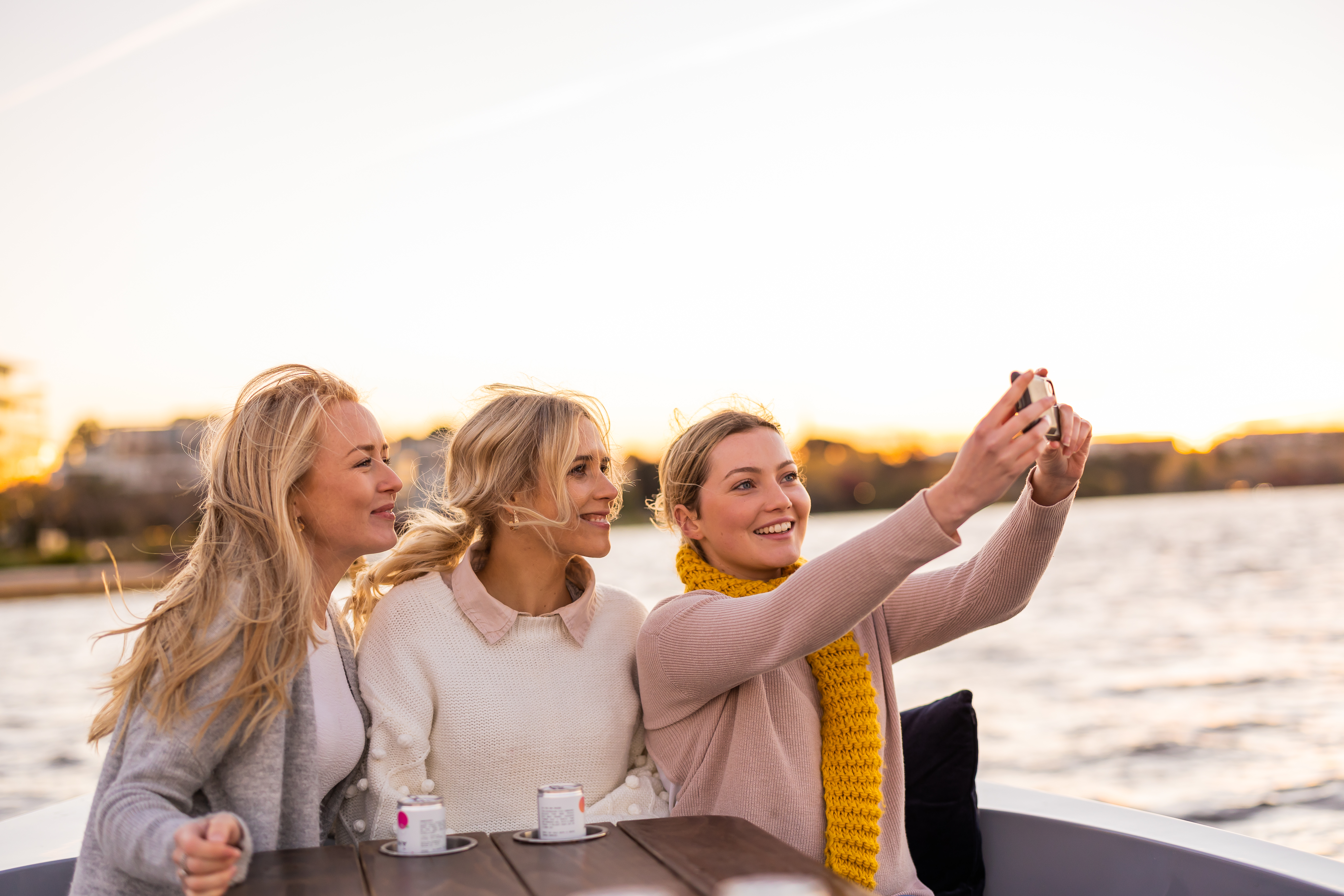 Three women taking a selfie on a GoBoat